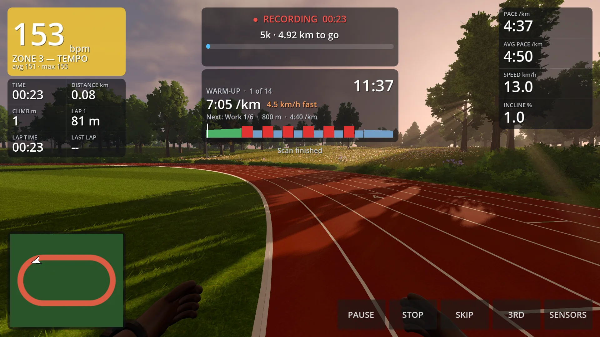 Running on the track in first person during a workout: the step, the time left in it, the pace it asks for and the whole workout drawn with a line where the runner is.