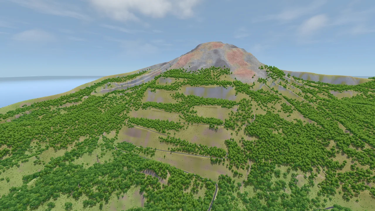 The volcano from the south-east, the hairpin road stacked up its green face below the bare cinder summit.